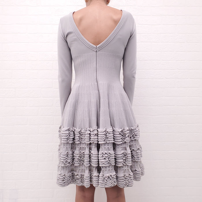 ALAÏA GREY LONG SLEEVE PEPLUM DRESS - SIZE 40