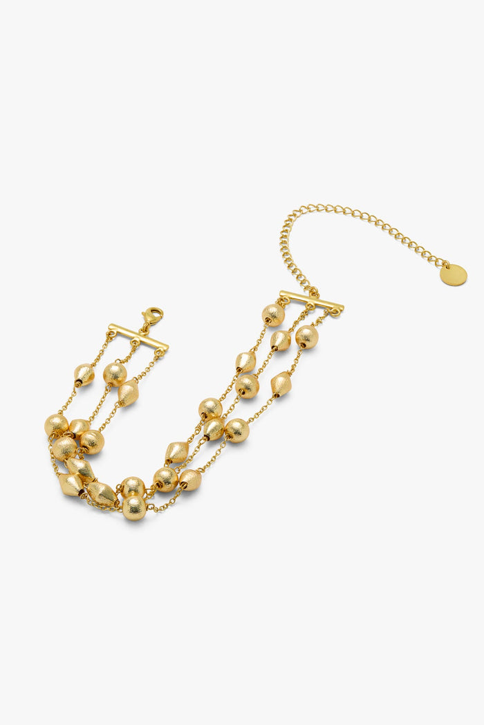 Choker Pía Dorado en Lady Pipa para completar looks de invitada.