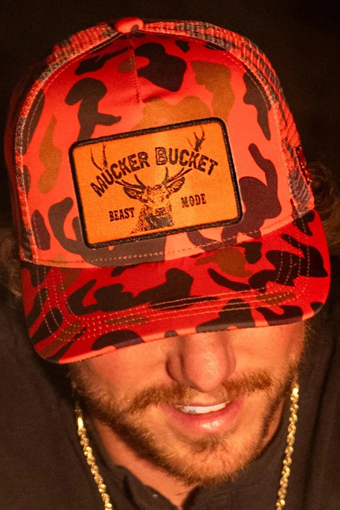 mucker bucket - "beast mode" orange camo trucker hat front