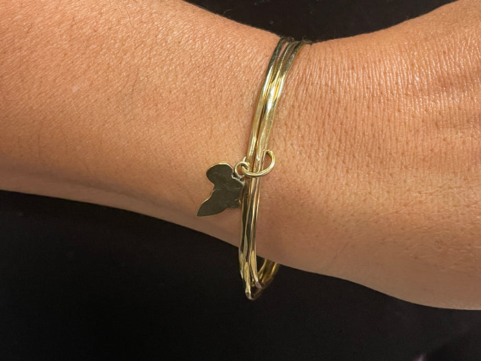 Bracelets - brass with Africa charm