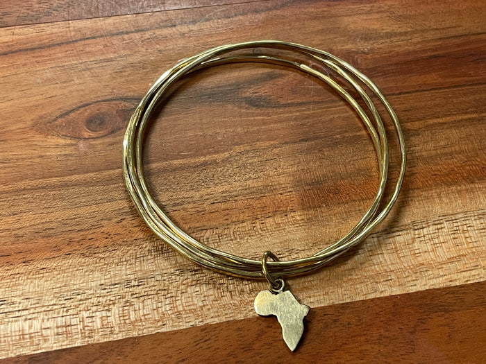 Bracelets - brass with Africa charm