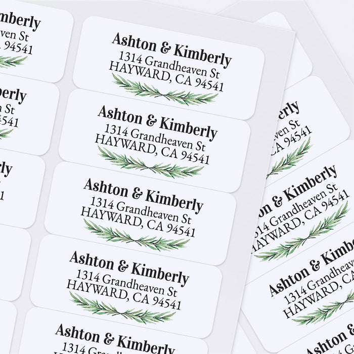 Sheet of personalized pine-themed return address stickers with green botanical accents and formal typography, ideal for weddings and holiday mailings - XOXOKristen
