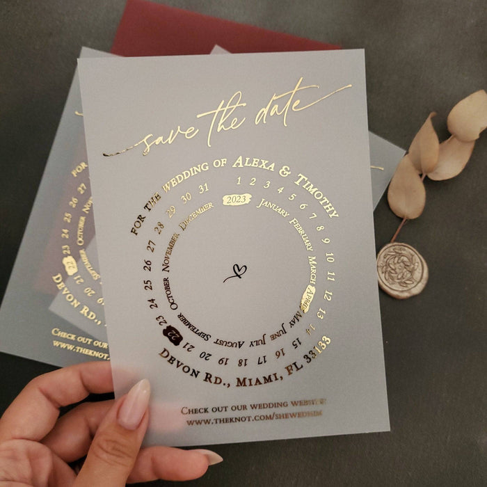 Modern vellum Save the Date card featuring gold foil circular calendar design and romantic script typography – XOXOKristen