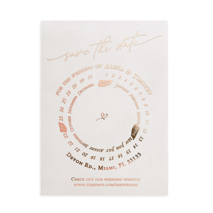 Transparent vellum Save the Date card with rose-gold foil accents and circular layout, styled on warm stone background with dried florals – XOXOKristen