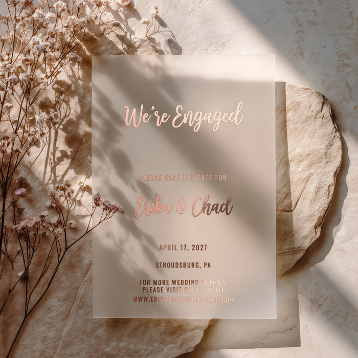 A soft and romantic rose gold foil version of the vellum card styled with dried flowers and warm light. The foil shimmer adds a touch of elegance, ideal for brides announcing their engagement in style - XOXOKristen